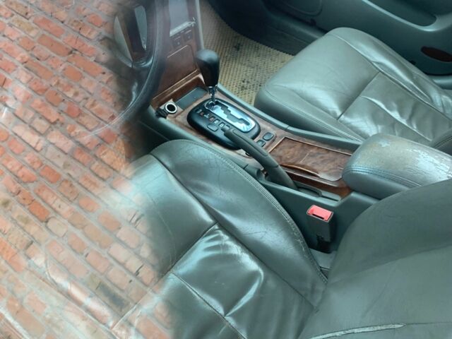 Серый Шевроле Эванда, объемом двигателя 2.5 л и пробегом 310 тыс. км за 2100 $, фото 5 на Automoto.ua