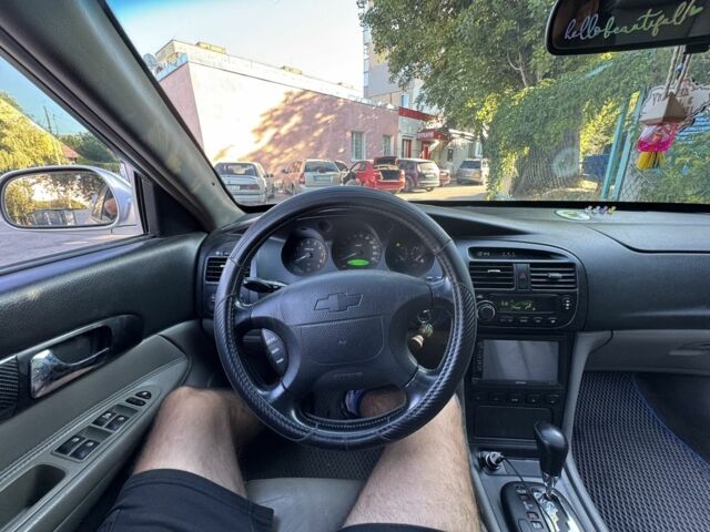 Серый Шевроле Эванда, объемом двигателя 2 л и пробегом 209 тыс. км за 3200 $, фото 10 на Automoto.ua