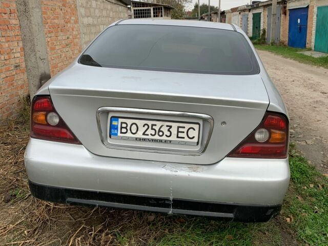 Серый Шевроле Эванда, объемом двигателя 2.5 л и пробегом 310 тыс. км за 2100 $, фото 3 на Automoto.ua