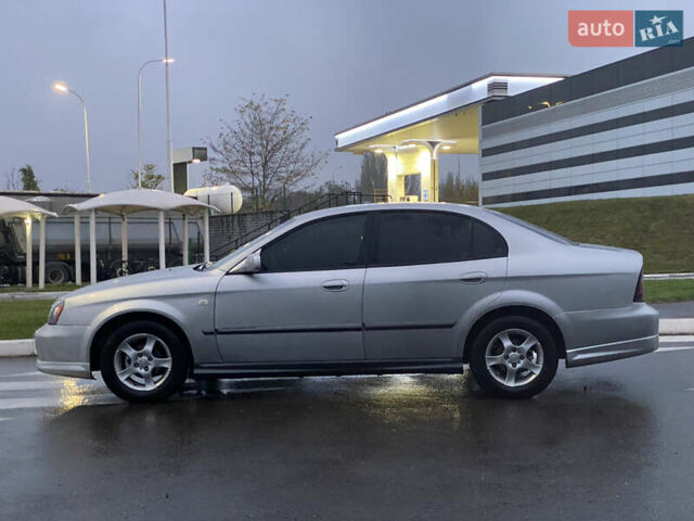 Серый Шевроле Эванда, объемом двигателя 2 л и пробегом 210 тыс. км за 3300 $, фото 5 на Automoto.ua