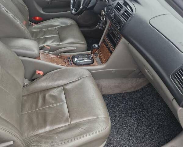 Сірий Шевроле Еванда, об'ємом двигуна 2.5 л та пробігом 103 тис. км за 5000 $, фото 15 на Automoto.ua