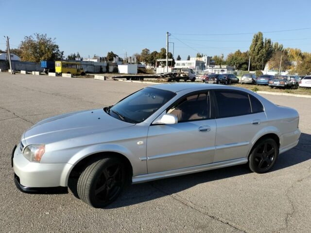 Серый Шевроле Эванда, объемом двигателя 2 л и пробегом 352 тыс. км за 3000 $, фото 1 на Automoto.ua