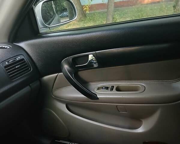 Серый Шевроле Эванда, объемом двигателя 2 л и пробегом 197 тыс. км за 3900 $, фото 8 на Automoto.ua