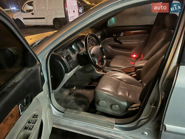 Серый Шевроле Эванда, объемом двигателя 2.5 л и пробегом 200 тыс. км за 2600 $, фото 8 на Automoto.ua