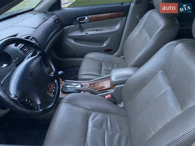 Серый Шевроле Эванда, объемом двигателя 2 л и пробегом 210 тыс. км за 3300 $, фото 9 на Automoto.ua