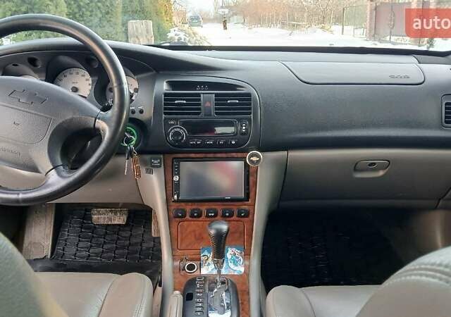 Сірий Шевроле Еванда, об'ємом двигуна 2.49 л та пробігом 113 тис. км за 4500 $, фото 6 на Automoto.ua