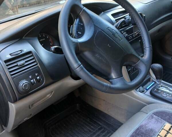 Серый Шевроле Эванда, объемом двигателя 2 л и пробегом 197 тыс. км за 3900 $, фото 4 на Automoto.ua