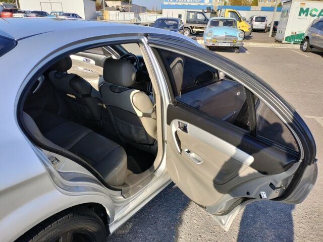 Серый Шевроле Эванда, объемом двигателя 2 л и пробегом 352 тыс. км за 3000 $, фото 10 на Automoto.ua