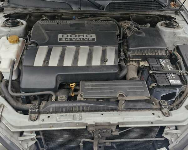 Сірий Шевроле Еванда, об'ємом двигуна 2.5 л та пробігом 103 тис. км за 5000 $, фото 10 на Automoto.ua