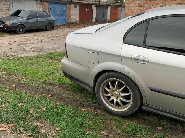 Серый Шевроле Эванда, объемом двигателя 2.5 л и пробегом 310 тыс. км за 2100 $, фото 7 на Automoto.ua