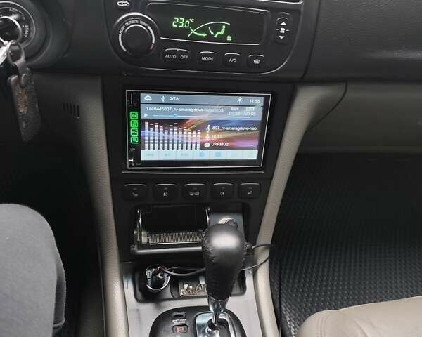 Серый Шевроле Эванда, объемом двигателя 2 л и пробегом 256 тыс. км за 4500 $, фото 13 на Automoto.ua