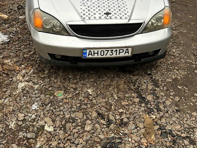 Серый Шевроле Эванда, объемом двигателя 2 л и пробегом 626 тыс. км за 5500 $, фото 1 на Automoto.ua
