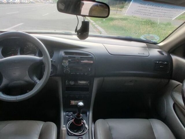 Сірий Шевроле Еванда, об'ємом двигуна 2 л та пробігом 219 тис. км за 3999 $, фото 22 на Automoto.ua