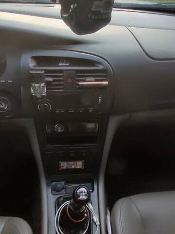 Сірий Шевроле Еванда, об'ємом двигуна 2 л та пробігом 219 тис. км за 3699 $, фото 22 на Automoto.ua