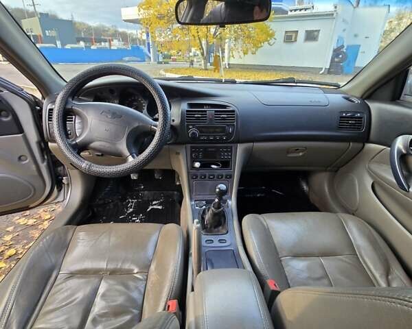 Серый Шевроле Эванда, объемом двигателя 2 л и пробегом 314 тыс. км за 3900 $, фото 13 на Automoto.ua