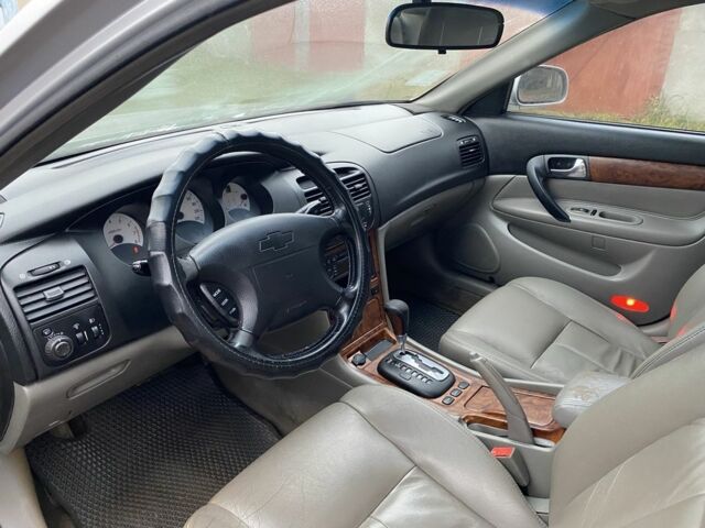 Сірий Шевроле Еванда, об'ємом двигуна 2.5 л та пробігом 310 тис. км за 3000 $, фото 4 на Automoto.ua