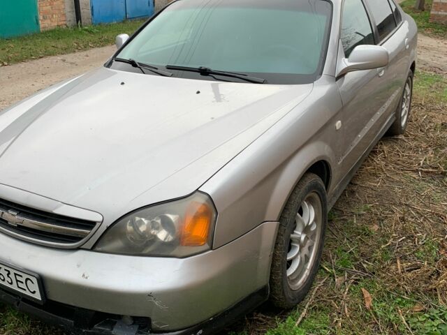 Серый Шевроле Эванда, объемом двигателя 2.5 л и пробегом 310 тыс. км за 2100 $, фото 1 на Automoto.ua