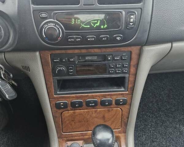 Сірий Шевроле Еванда, об'ємом двигуна 2.5 л та пробігом 103 тис. км за 5000 $, фото 12 на Automoto.ua