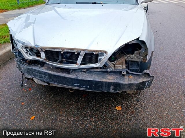 Серый Шевроле Эванда, объемом двигателя 2 л и пробегом 220 тыс. км за 1200 $, фото 2 на Automoto.ua