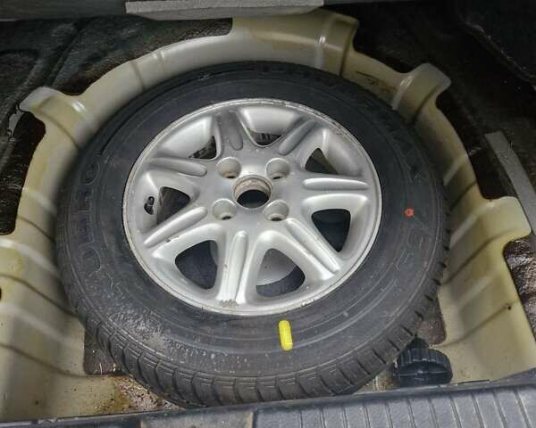 Сірий Шевроле Еванда, об'ємом двигуна 2.5 л та пробігом 103 тис. км за 5000 $, фото 9 на Automoto.ua