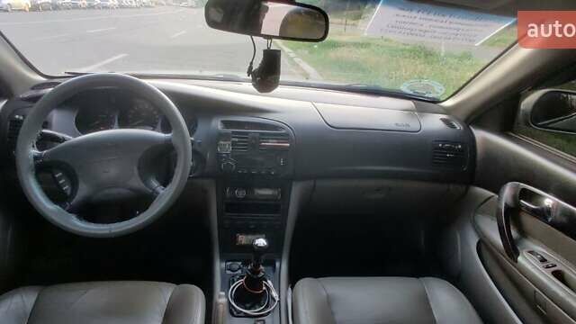 Сірий Шевроле Еванда, об'ємом двигуна 2 л та пробігом 219 тис. км за 3699 $, фото 21 на Automoto.ua