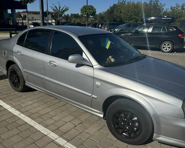 Серый Шевроле Эванда, объемом двигателя 2 л и пробегом 350 тыс. км за 3111 $, фото 3 на Automoto.ua