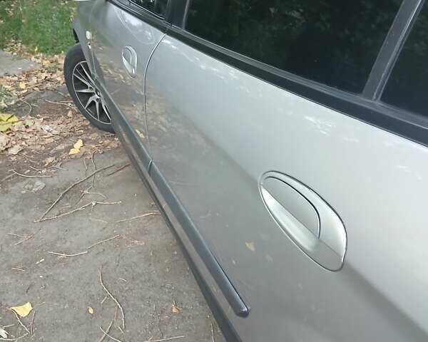 Серый Шевроле Эванда, объемом двигателя 2 л и пробегом 197 тыс. км за 3900 $, фото 9 на Automoto.ua