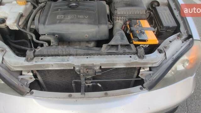 Сірий Шевроле Еванда, об'ємом двигуна 2 л та пробігом 219 тис. км за 3699 $, фото 41 на Automoto.ua