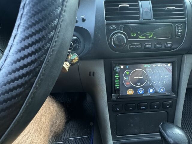 Серый Шевроле Эванда, объемом двигателя 2 л и пробегом 209 тыс. км за 3200 $, фото 9 на Automoto.ua