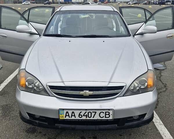 Сірий Шевроле Еванда, об'ємом двигуна 2.5 л та пробігом 103 тис. км за 5000 $, фото 8 на Automoto.ua