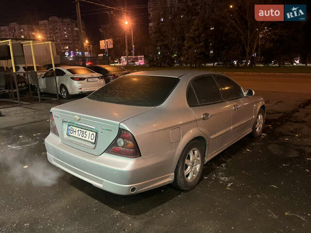 Серый Шевроле Эванда, объемом двигателя 2.5 л и пробегом 200 тыс. км за 2600 $, фото 4 на Automoto.ua