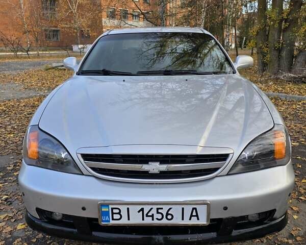 Серый Шевроле Эванда, объемом двигателя 2 л и пробегом 314 тыс. км за 3900 $, фото 7 на Automoto.ua