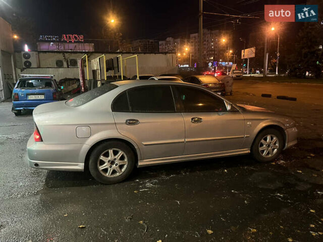 Серый Шевроле Эванда, объемом двигателя 2.5 л и пробегом 200 тыс. км за 2600 $, фото 5 на Automoto.ua