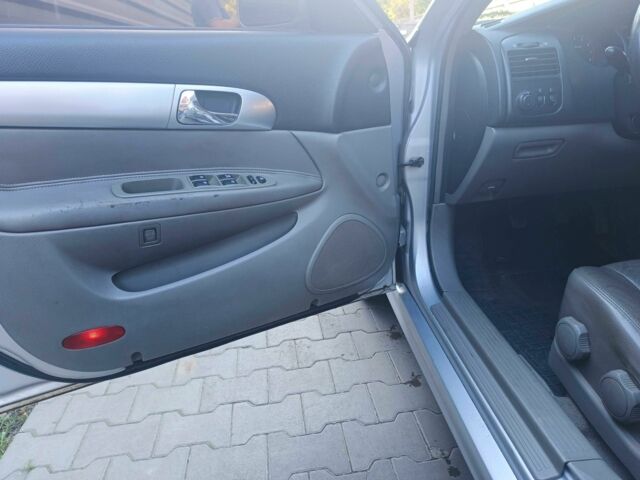 Сірий Шевроле Еванда, об'ємом двигуна 2 л та пробігом 320 тис. км за 4800 $, фото 4 на Automoto.ua