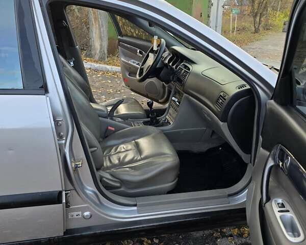 Серый Шевроле Эванда, объемом двигателя 2 л и пробегом 314 тыс. км за 3900 $, фото 20 на Automoto.ua