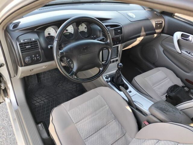 Серый Шевроле Эванда, объемом двигателя 2 л и пробегом 352 тыс. км за 3000 $, фото 13 на Automoto.ua