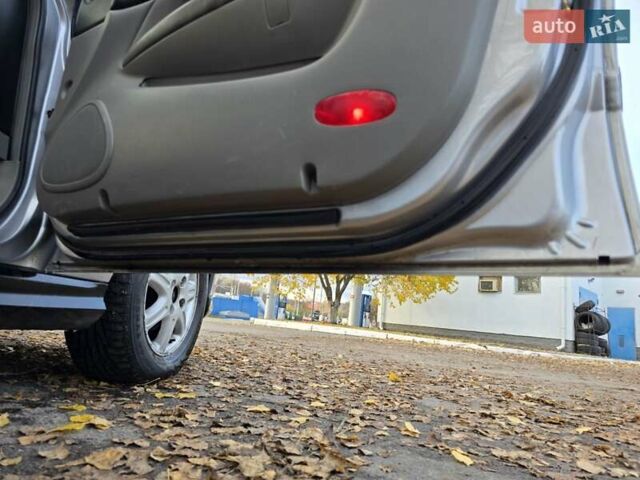 Серый Шевроле Эванда, объемом двигателя 2 л и пробегом 314 тыс. км за 3900 $, фото 22 на Automoto.ua