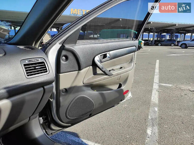 Серый Шевроле Эванда, объемом двигателя 2 л и пробегом 340 тыс. км за 2700 $, фото 10 на Automoto.ua