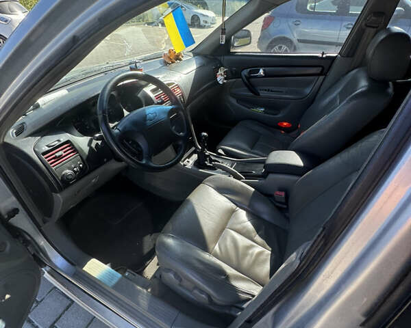 Серый Шевроле Эванда, объемом двигателя 2 л и пробегом 350 тыс. км за 3111 $, фото 10 на Automoto.ua