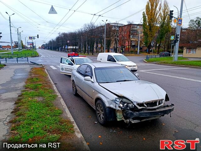 Серый Шевроле Эванда, объемом двигателя 2 л и пробегом 220 тыс. км за 1200 $, фото 3 на Automoto.ua