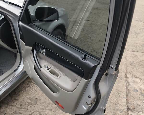 Серый Шевроле Эванда, объемом двигателя 2 л и пробегом 256 тыс. км за 4500 $, фото 20 на Automoto.ua