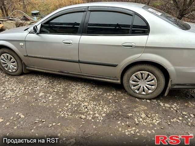 Серый Шевроле Эванда, объемом двигателя 2 л и пробегом 626 тыс. км за 5500 $, фото 6 на Automoto.ua