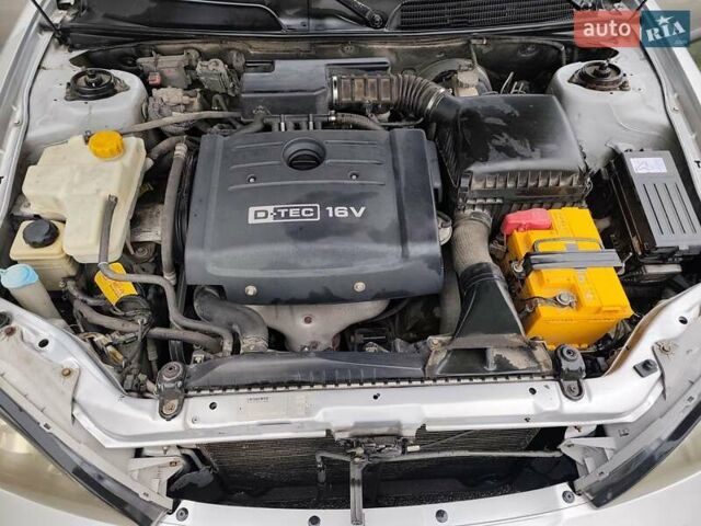 Серый Шевроле Эванда, объемом двигателя 2 л и пробегом 256 тыс. км за 4500 $, фото 11 на Automoto.ua