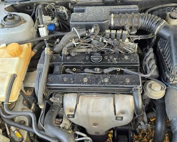 Серый Шевроле Эванда, объемом двигателя 2 л и пробегом 314 тыс. км за 3900 $, фото 27 на Automoto.ua