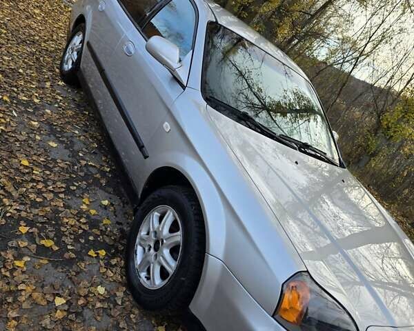 Серый Шевроле Эванда, объемом двигателя 2 л и пробегом 314 тыс. км за 3900 $, фото 1 на Automoto.ua