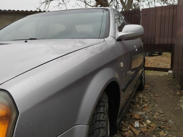 Серый Шевроле Эванда, объемом двигателя 2 л и пробегом 305 тыс. км за 2700 $, фото 1 на Automoto.ua