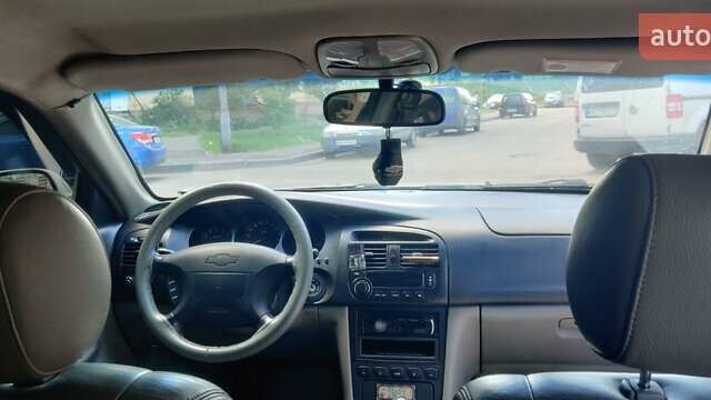 Сірий Шевроле Еванда, об'ємом двигуна 2 л та пробігом 219 тис. км за 3699 $, фото 9 на Automoto.ua