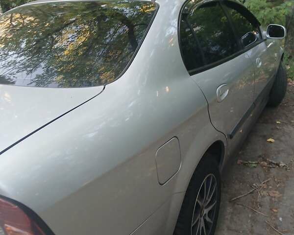 Серый Шевроле Эванда, объемом двигателя 2 л и пробегом 197 тыс. км за 3900 $, фото 7 на Automoto.ua