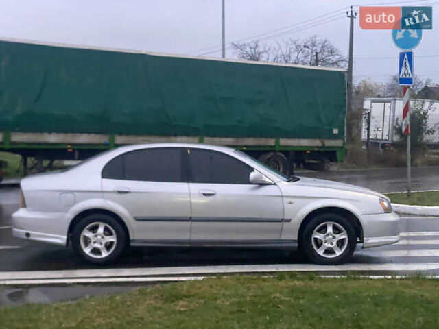 Серый Шевроле Эванда, объемом двигателя 2 л и пробегом 210 тыс. км за 3300 $, фото 4 на Automoto.ua