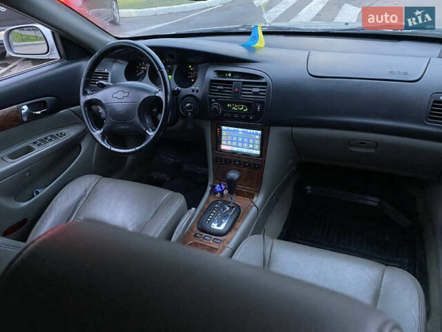 Серый Шевроле Эванда, объемом двигателя 2 л и пробегом 210 тыс. км за 3300 $, фото 6 на Automoto.ua